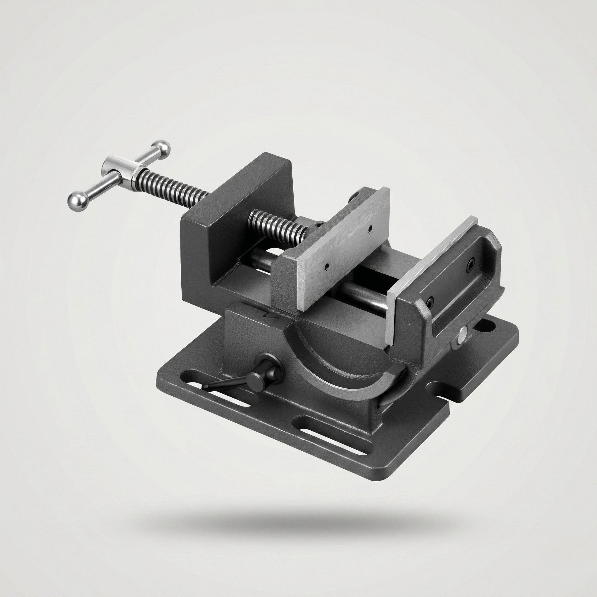Industrial drill press tilting vise with slotted mounting base, hardened steel jaw plates, and ACME threaded screw for secure workpiece clamping