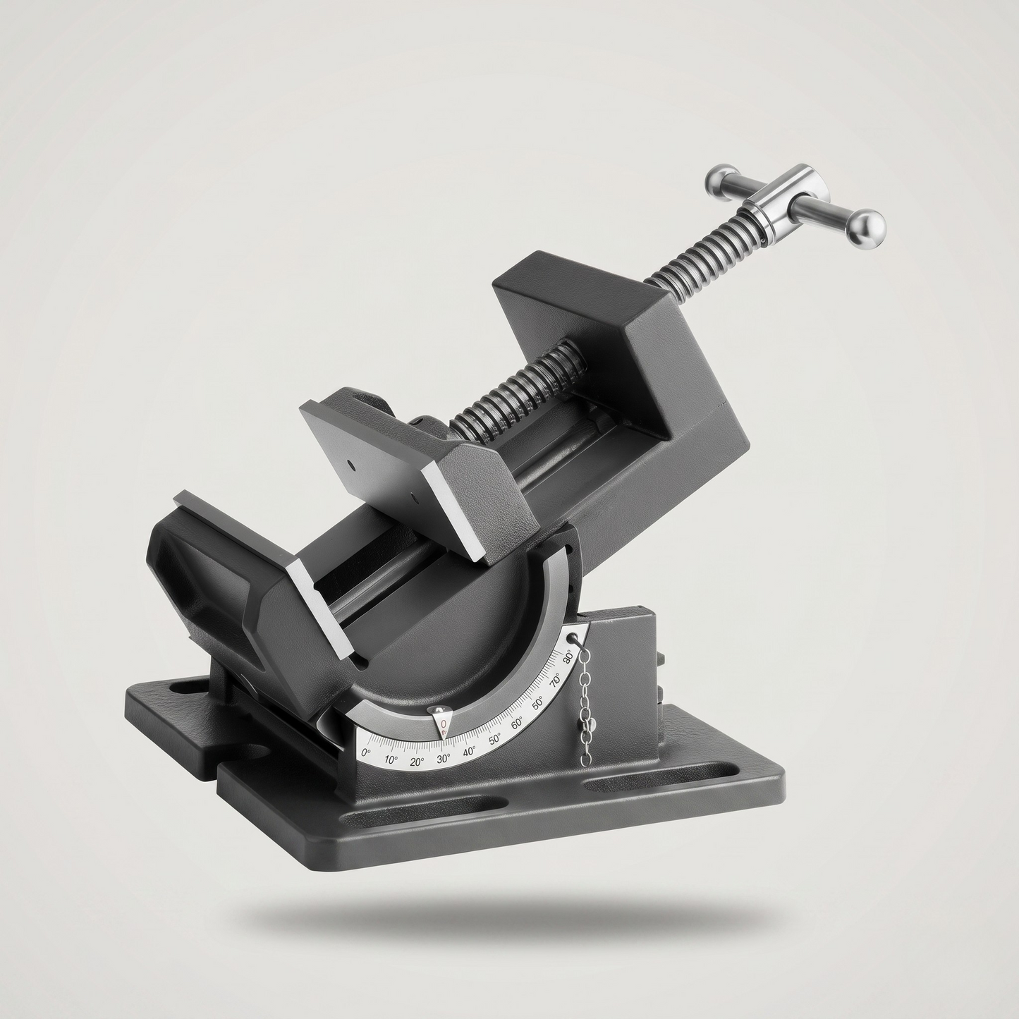 Top-down view of tilting angle vise showing universal slotted mounting holes compatible with drill press tables and workbenches