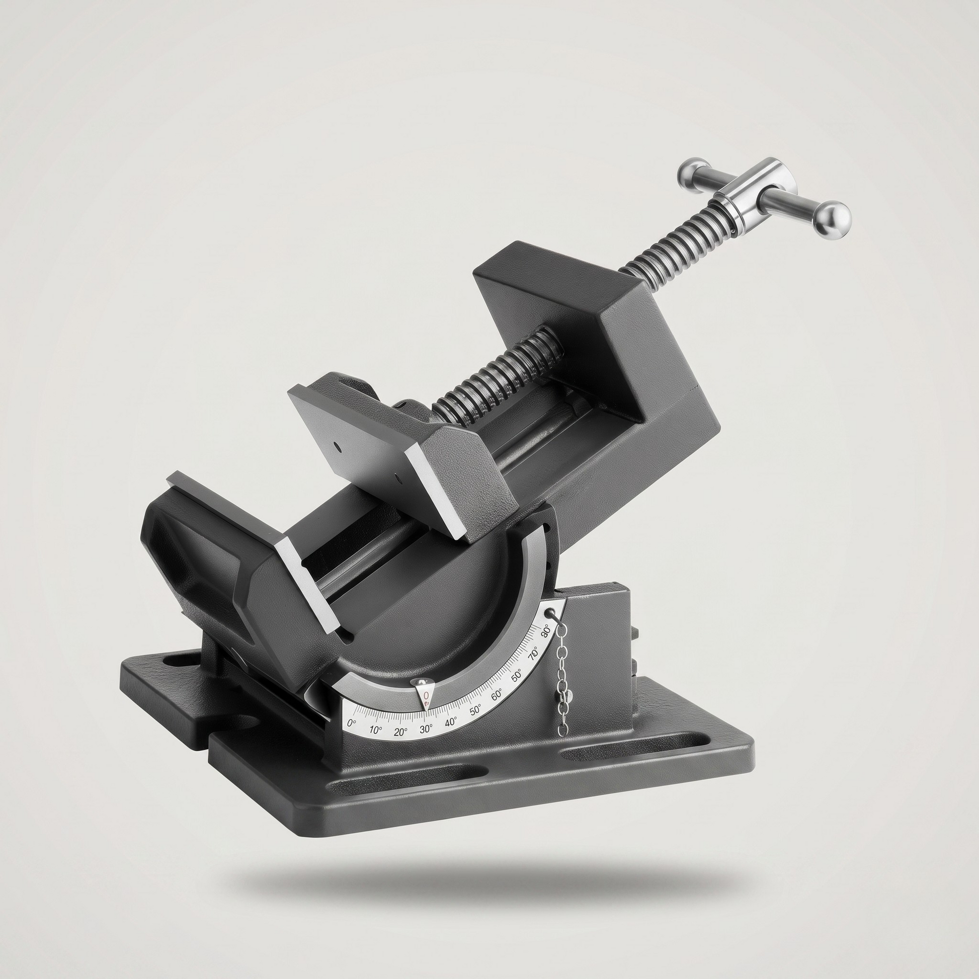 Top-down view of tilting angle vise showing universal slotted mounting holes compatible with drill press tables and workbenches